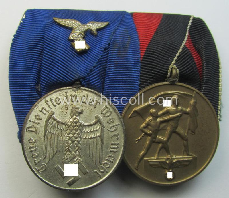 Superb example of a two-pieced WH (Luftwaffe) medal-bar (ie.: 'Doppelspange') resp. showing a: 'WH-DA 4. Stufe' (with firmly attached eagle-device!) and a Czech 'Anschluss'-medal