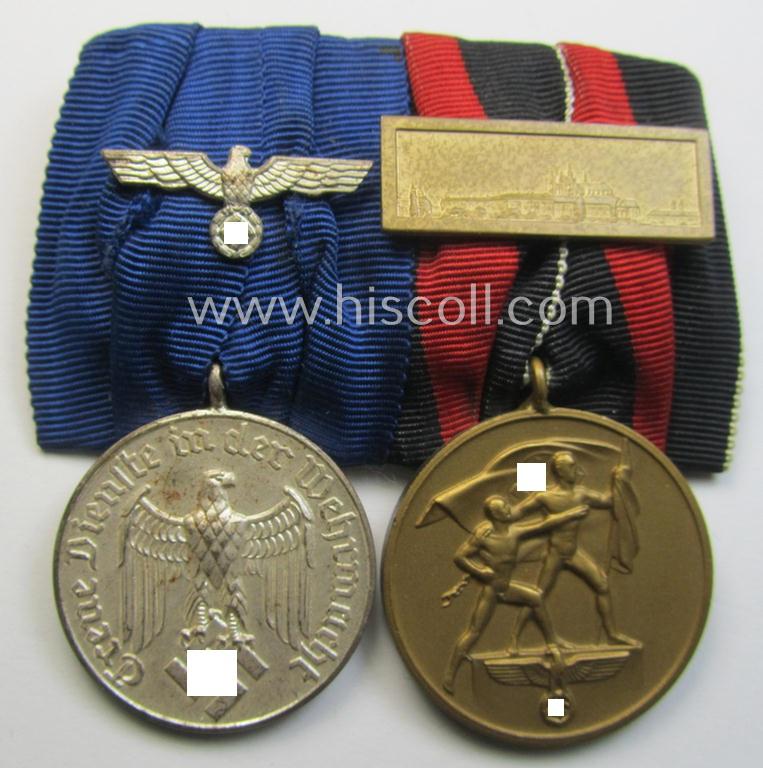 Superb example of a two-pieced WH (Heeres o. Kriegsmarine) medal-bar (ie.: 'Doppelspange') resp. showing a: 'WH-DA 4. Stufe' and a Czech 'Anschluss'-medal that comes with a firmly attached 'Prager Burg-Spange'
