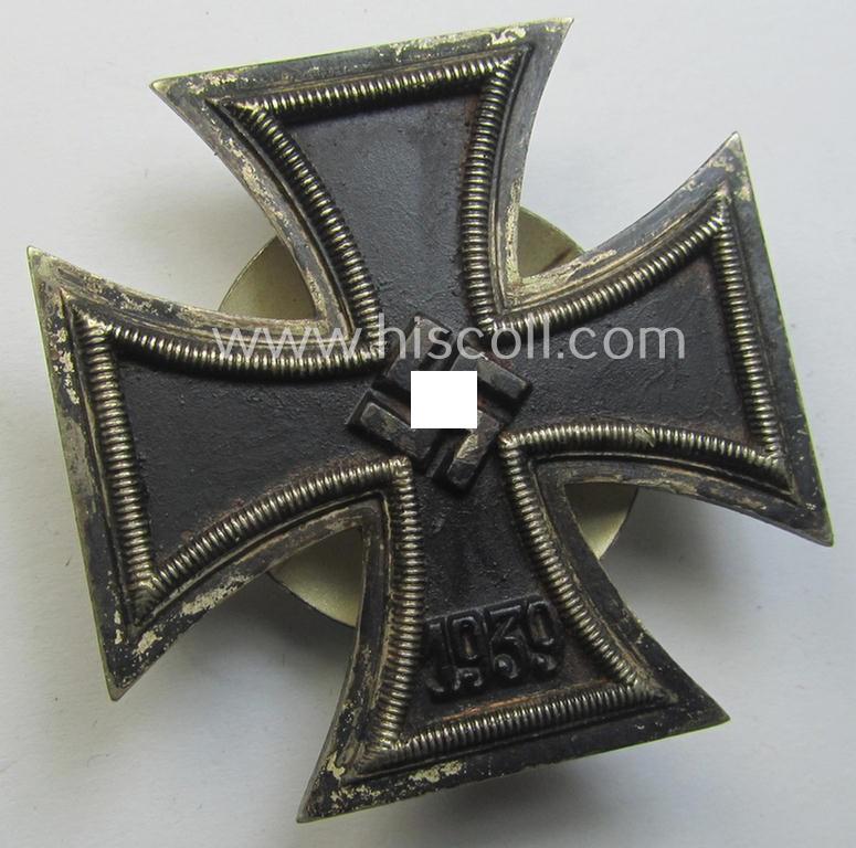 Attractive - and moderately used! - Iron Cross 1st class (or: 'Eisernes Kreuz 1. Klasse') as executed in the scarcely seen so-called: 'screw-back'- (ie. 'An der Schraube'-) pattern being an 'L/54'- (= 'Schauerte & Höhfeld'-) marked example
