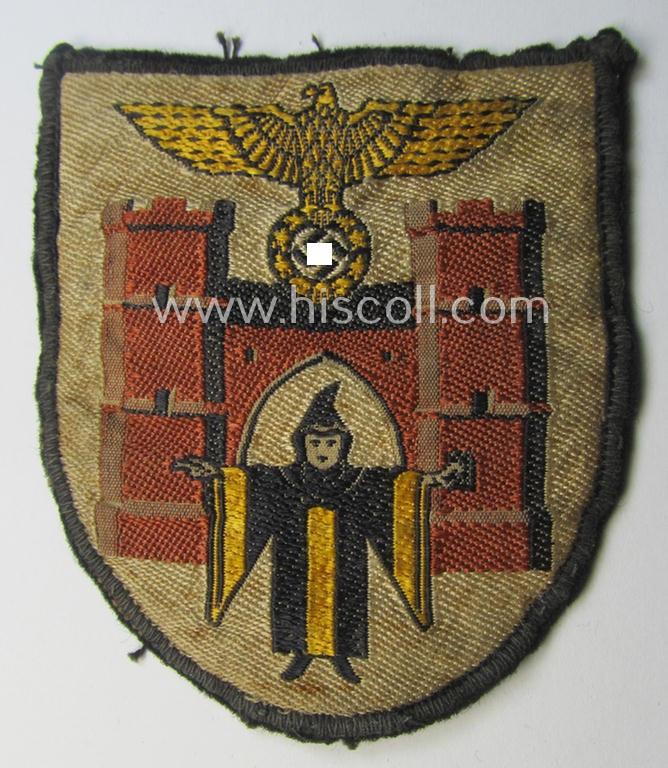 Superb - and only once before by me encountered! - multi-coloured N.S.D.A.P.-related arm-shield (or armband-device) showing the coat of arms of the town of München (ie. 'Hauptstadt der Bewegung')