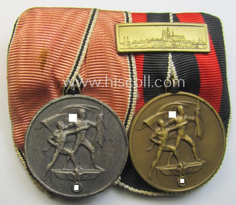 Superb example of a two-pieced WH (Heeres o. Kriegsmarine etc.) medal-bar (ie.: 'Doppelspange') resp. showing an: Austrian- and Czech 'Anschluss'-medal (that comes with a firmly attached 'Prager Burg-Spange')