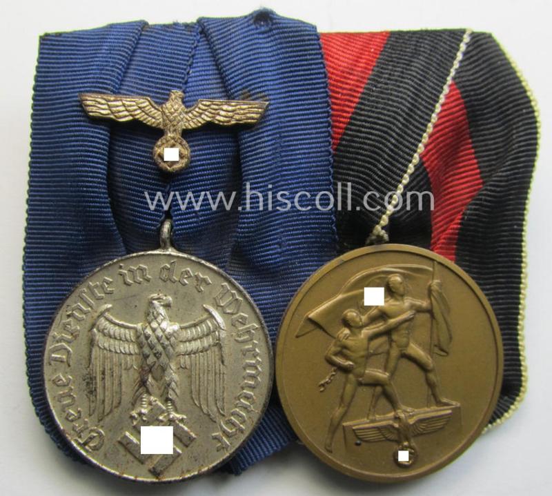 Attractive example of a two-pieced WH (Heeres o. KM) medal-bar (ie.: 'Doppelspange') resp. showing a: 'WH-DA 4. Stufe' (with firmly attached eagle-device!) and a Czech 'Anschluss'-medal