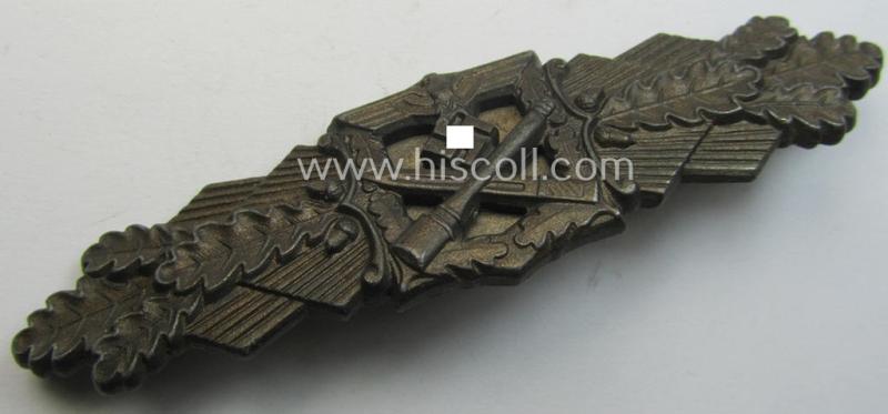 Superb 'Nahkampfspange in Bronze' (or: bronze-class close-combat clasp ie. CCC) being a maker- (ie. 'FLL'-) marked, so-called: '3rd pattern'-specimen as was produced by the maker- (ie. 'Hersteller') 'Friedrich Linden'