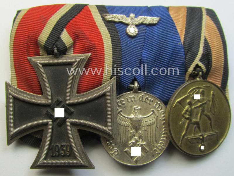 Superb example of a 3-pieced WH (Heeres o. KM etc.) medal-bar (ie.: 'Ordenspange') resp. showing an: 'EKII. Kl.', a: 'WH-DA 4. St.' (with silver-toned eagle-device) and a Czech 'Anschluss'-medal