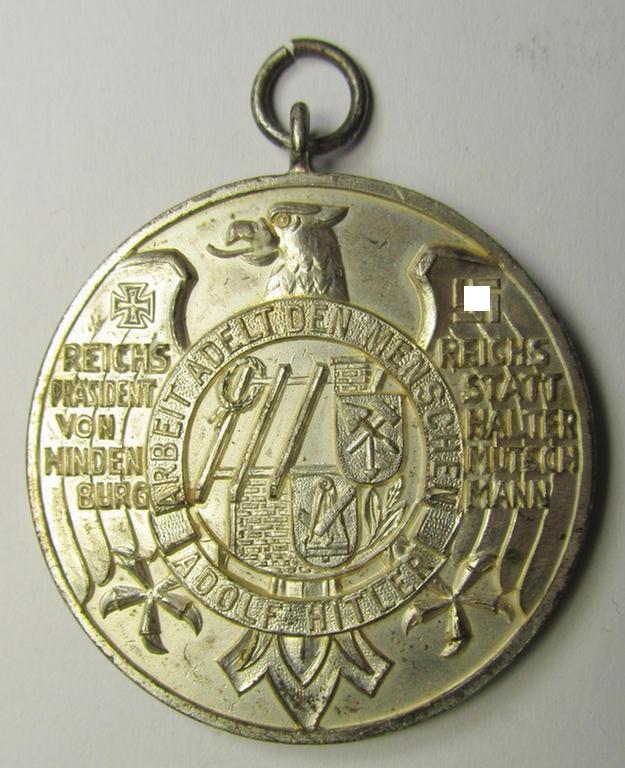 Bright-silver-toned, so-called: commemorative-medal (ie. 'Erinnerungs- o. nichttragbare Medaille') entitled: 'Arbeit adelt den Menschen - Adolf Hitler - 1924 - 1934'