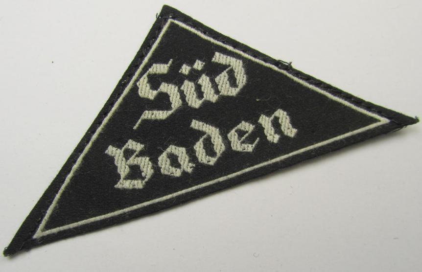 'HJ' ('Hitlerjugend') ie. 'BDM' ('Bund Deutscher Mädel'-) district-triangle (ie. 'Gebietsdreieck') entitled: 'Süd Baden' (being a hardly used- and/or IMO never worn example that still retains its period-attached 'RzM'-etiket)