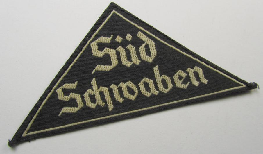 'HJ' ('Hitlerjugend') ie. 'BDM' ('Bund Deutscher Mädel'-) district-triangle (ie. 'Gebietsdreieck') entitled: 'Süd Schwaben' (being a hardly used- and/or IMO never worn example that still retains its period-attached 'RzM'-etiket)