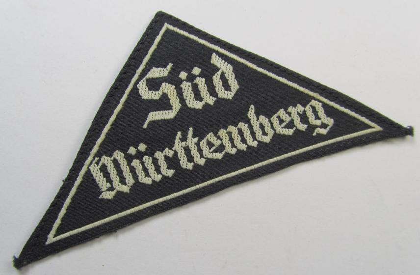 'HJ' ('Hitlerjugend') ie. 'BDM' ('Bund Deutscher Mädel'-) district-triangle (ie. 'Gebietsdreieck') entitled: 'Süd Württemberg' (being an IMO never worn example that still retains its period-attached 'RzM'-etiket)