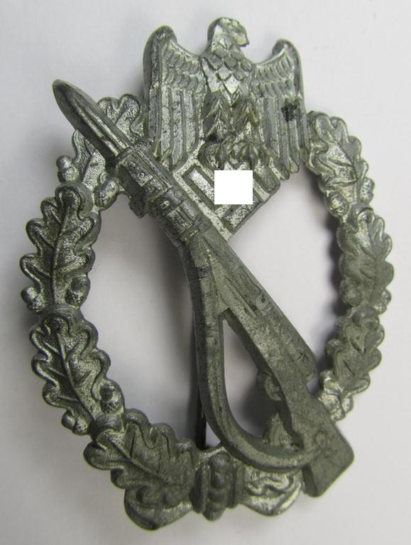 'Infanterie Sturmabzeichen in Silber', being an unmarked (and/or very converse- ie. vaulted-) 'hollow-back' example by the maker: 'Friedrich Linden' (ie. 'F.L.L.') as was executed in silver-coloured, zinc-based metal (ie. 'Feinzink')