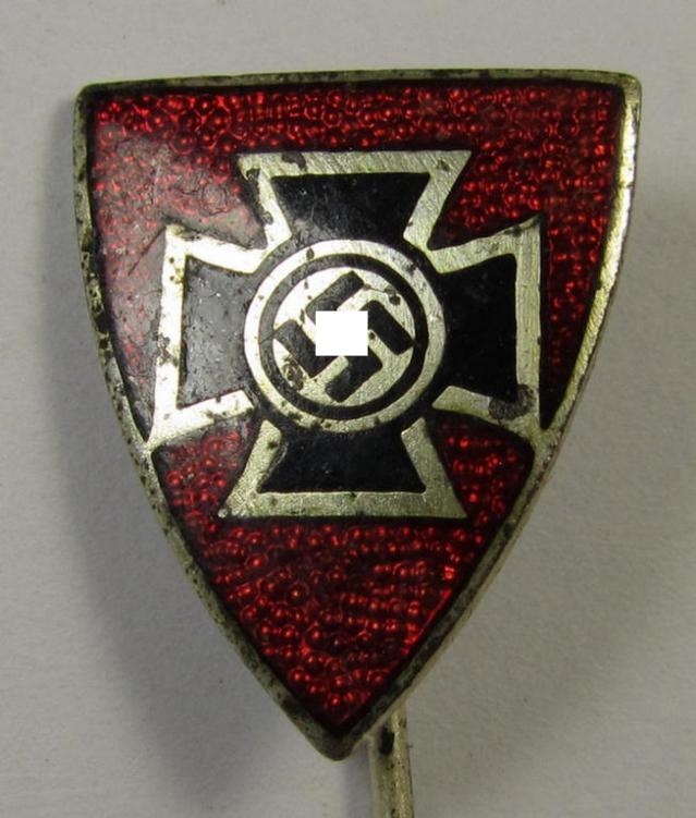 Membership-lapel-pin as was intended to signify membership within the: 'Nationalsocialistischer Reichskriegerbund' (ie. 'N.S.R.K.B.') being a non-maker-marked example that bears a: 'Ges.Gesch.'-patent-pending-designation on its back