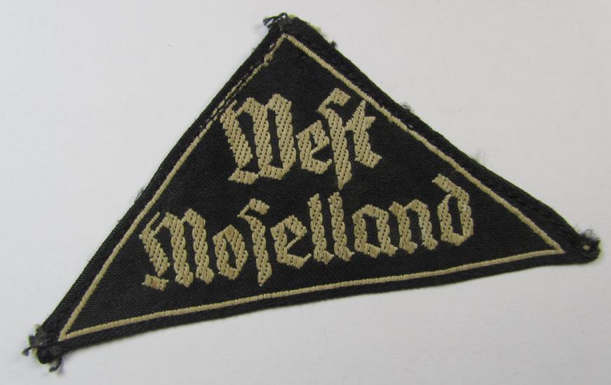 'HJ' ('Hitlerjugend') ie. 'BDM' ('Bund Deutscher Mädel'-) district-triangle (ie. 'Gebietsdreieck') entitled: 'West Moselland' (being a moderately used- and/or IMO once worn example that misses its so-called: 'RzM'-etiket)