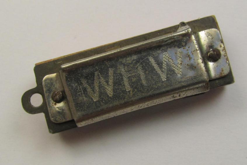 Unusally seen so-called: WHW- (ie. 'Winterhilfswerke'-) related miniature harmonica entitled: 'WHW' that comes  in a moderately used condition