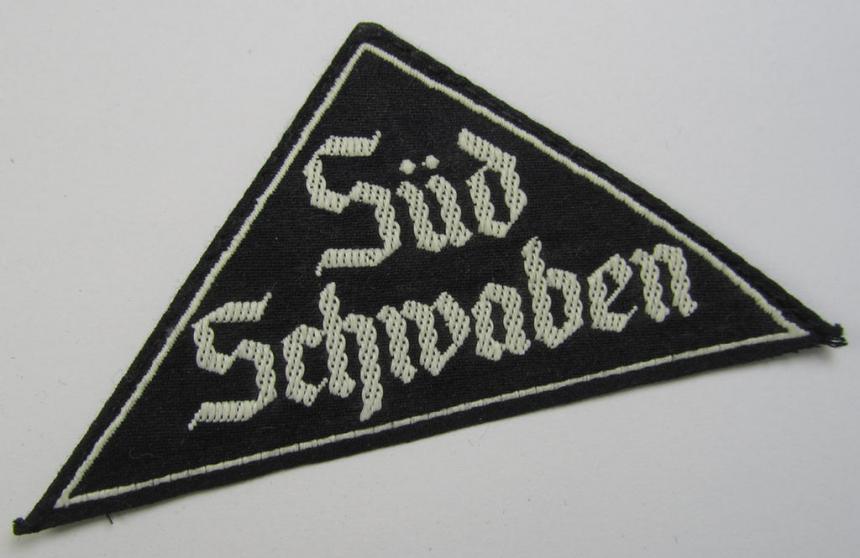 'HJ' ('Hitlerjugend') ie. 'BDM'- ('Bund Deutscher Mädel'-) district-triangle (ie. 'Gebietsdreieck') entitled: 'Süd Schwaben' (being a 'virtually mint- ie. unissued' example that still retains its period-attached 'RzM'-etiket)