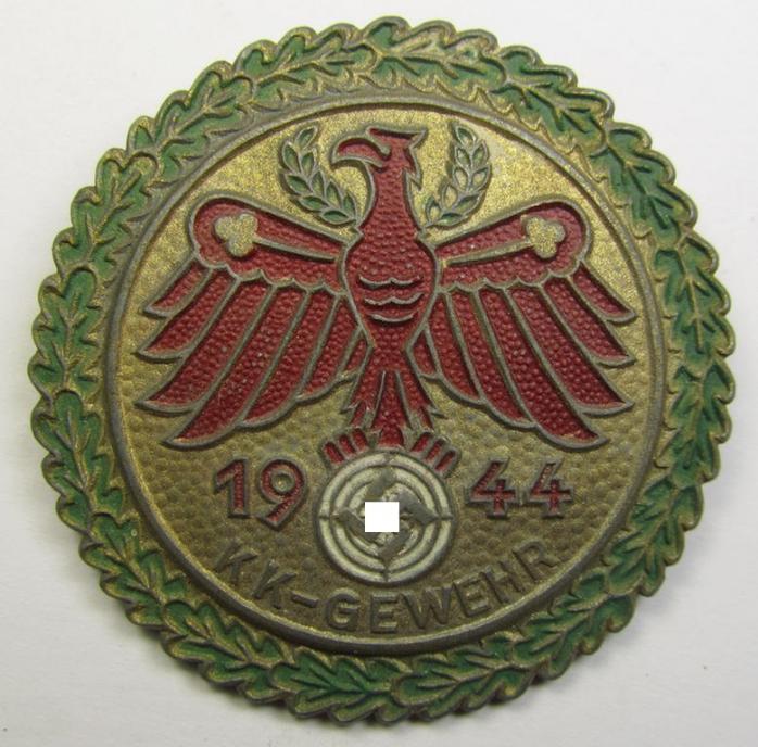 Multi-coloured- and very detailed so-called: 'Gaumeisterabzeichen 1944 in Gold mit Eichenlaubkranz des Standschützenverbandes Tirol-Vorarlberg' (as was awarded for the 'K.K.-Gewehr'(ie. 'Klein Kaliber-Gewehr')