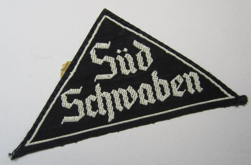 'HJ' ('Hitlerjugend') ie. 'BDM' ('Bund Deutscher Mädel'-) district-triangle (ie. 'Gebietsdreieck') entitled: 'Süd Schwaben' (being a hardly used- and/or IMO never worn example that still retains its period-attached 'RzM'-etiket)