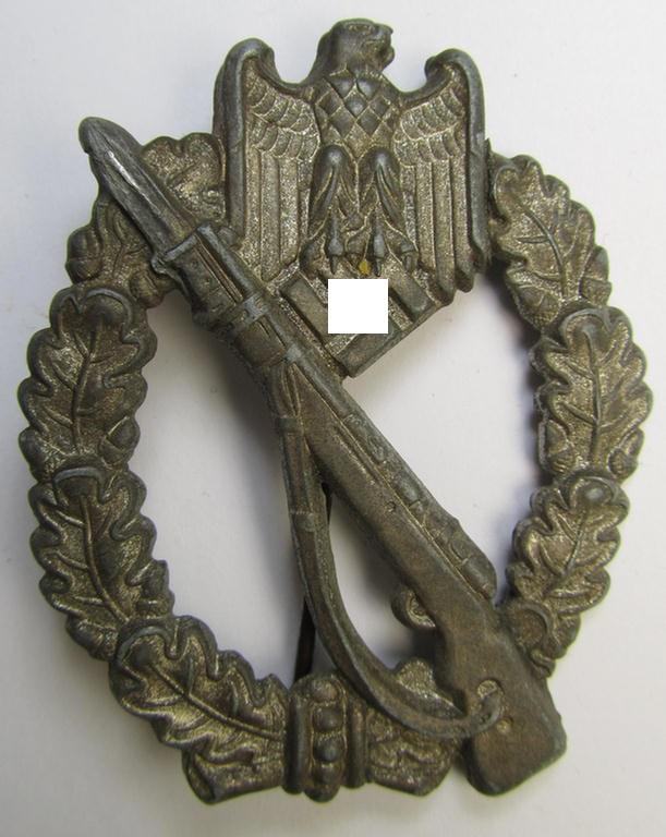 Attractive, 'hollow-back' 'Infanterie Sturmabzeichen in Silber' (or: silver infantry-assault badge ie. IAB) being a non-maker-marked example as executed in zinc-based metal (ie. 'Feinzink') as was produced by the: 'Wilh. Deumer'-company