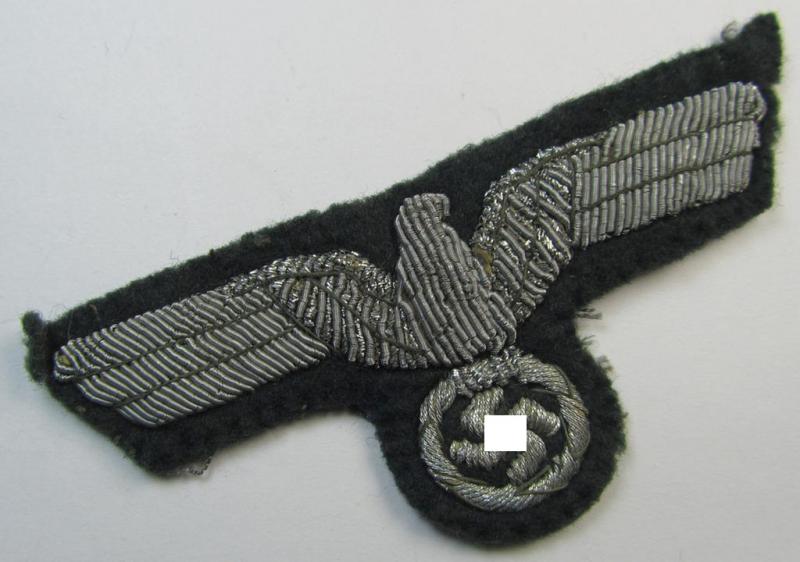 WH (Heeres) officers'-type, hand-embroidered breast-eagle (ie. 'Brustadler für Offiziere') as was executed in bright-silverish-coloured braid on a darker-green-coloured background as was intended for usage on the various officers'-pattern tunics