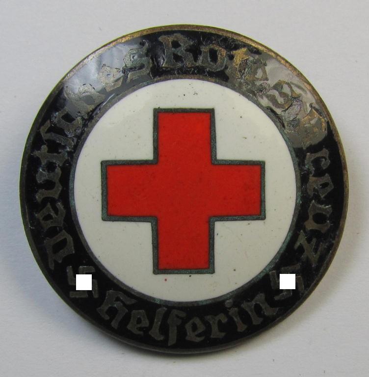 Attractive example of a DRK (ie. 'Deutsches Rotes Kreuz' or German Red Cross) nurses'-badge as was intended for a: 'Helferin' being a non-maker-marked example that comes in a fully untouched condition