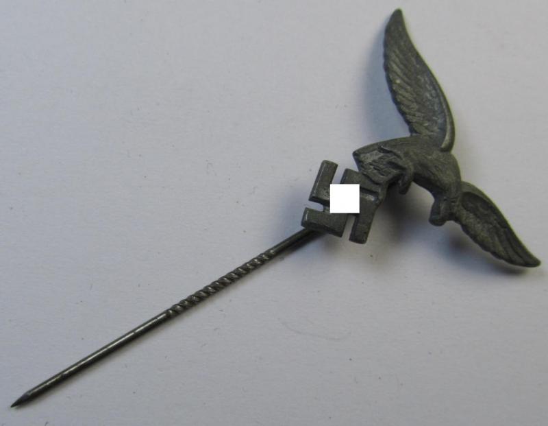 Silverish-grey-toned lapel-pin (ie. 'Zivilabzeichen') to be worn on the civil attire as was intended for usage by the various staff-members of the 'Luftwaffe' (depicting an early-pattern- ie. 'down-tailed'-eagle)