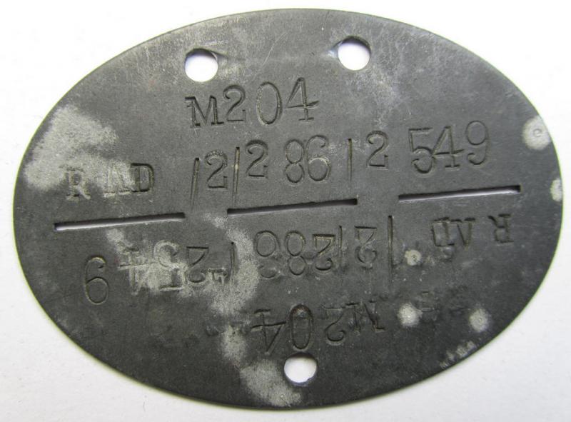 Unusually seen, zinc-based RAD- (ie. 'Reichsarbeitsdienst'-) related ID-disc (ie. 'Erkennungsmarke') bearing the stamped text ie. unit-designation: 'RAD/2/286/2 549' and that comes as recently found