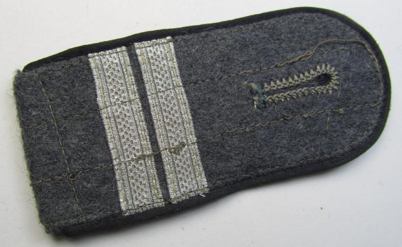 Single - but nevertheless scarcely seen! - 'Ostvölker'-related, 'Luftwaffe'-type shoulderstrap showing the black-coloured piping (and having a pair of horizontally-mounted rank-stripes 'off-factory'-attached)