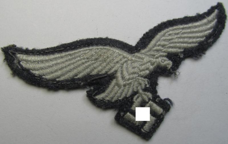 WH (Luftwaffe) 'standard-issue'-pattern breast-eagle (ie. 'Brustadler für Mannschaften u. Uffz. der Luftwaffe') being a machine-embroidered example and that comes in a neat and carefully tunic-removed condition
