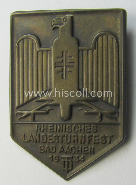 Unusual, 'Deutscher Turnerbund'-related 'tinnie' being a maker- (ie. 'Calles - Aachen'-) marked example depicting a stylished eagle-device, TD-logo and text: 'Rheinisches Landesturnfest - Bad Aachen - 1934'