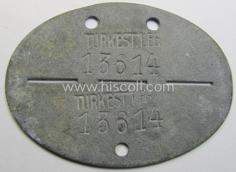 Attractive - scarcely found! - 'Ostvölker'-related ID-disc (ie. 'Erkennungsmarke') bearing the unit-designation that reads: 'Turkest. Leg - 13614' (and as such intended for a member that served within the 'Turkistanisches Legion'