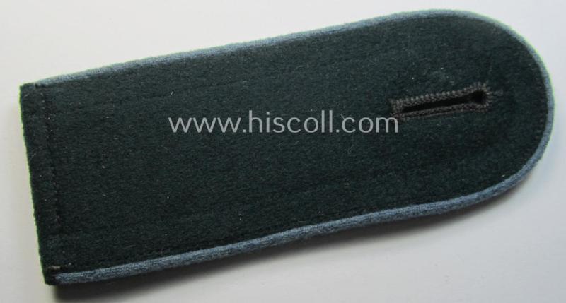 Single - early (ie. pre-) war-period - so-called: 'M36 o. M40'-pattern, WH (Heeres) EM-type shoulderstrap as piped in the light-blue-coloured branchcolour as was intended for usage by a: 'Soldat der Nachschub-Truppen'
