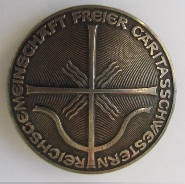 Rarely encountered RFC (ie. 'Reichsgemeinschaft freier Caritasschwestern' (or German nurses' association) badge (ie. 'Dienstbrosche'), executed in genuine '800'-marked silver - very nice condition!