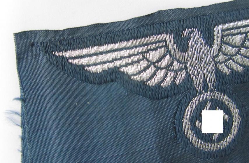 Very nice BZP (ie. 'Bahnschutz-Polizei') officers'-/ie. NCO-type side-cap (ie. 'Schiffchen') eagle, executed in woven silver thread (ie. 'flatwire-style') on a greyish-blue, linnen-based background - very nice (ie. stonemint-/unissued!) condition!