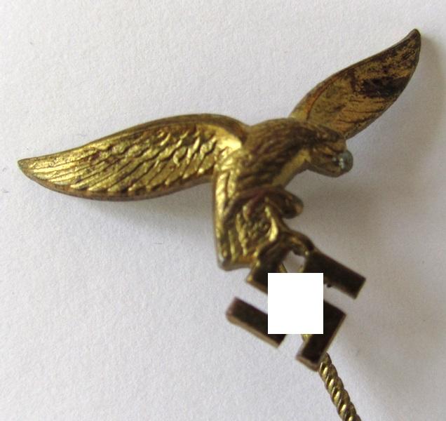 Neat, golden-toned (WH) Luftwaffe-related lapel-pin to be worn on the civil attire as intended for staff-members of the 'Luftwaffe', depicting an early pattern (i.e. 'down-tail'-modelled-) eagle - very nice, IMO only minimally used ie. worn, condition!
