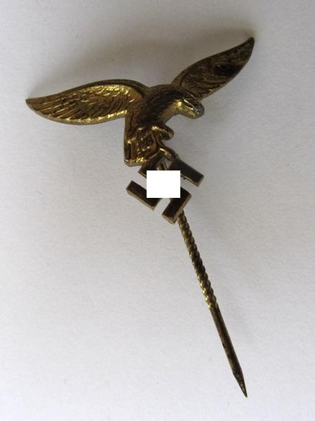 Neat, golden-toned (WH) Luftwaffe-related lapel-pin to be worn on the civil attire as intended for staff-members of the 'Luftwaffe', depicting an early pattern (i.e. 'down-tail'-modelled-) eagle - very nice, IMO only minimally used ie. worn, condition!