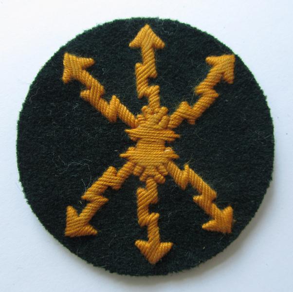 Neat, WH (Heeres) hand-embroidered, trade- ie. special career arm-patch, as intended for a: 'Funkmeister' (or radio-equipment NCO), executed on darker-green coloured wool, that is nicely maker-marked on the back - nice (ie. mint-/unissued-) condition!
