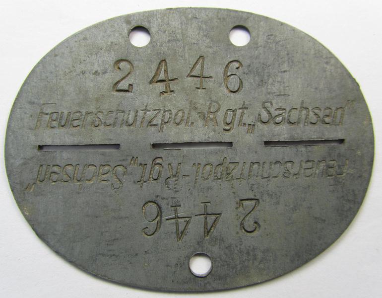 Interesting - and actually never before encountered! - 'Feinzink'-based and/or WWII-period (ie. 'Feuerschutzpolizei'-related-) ID-disc, bearing the stamped unit-designation: 'Feuerschutzpol. Rgt. Sachsen' - overall nice condition!