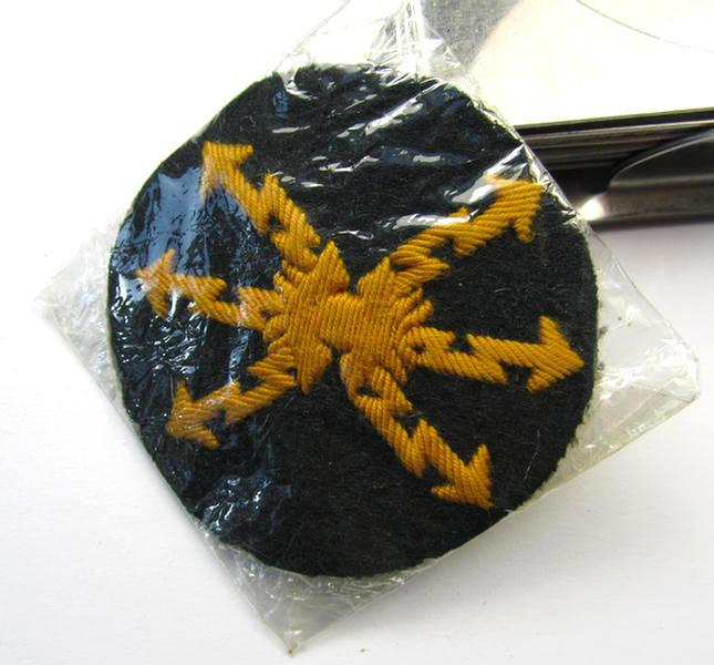 Neat, WH (Heeres) hand-embroidered, trade- ie. special career arm-patch, as intended for a: 'Funkmeister', as executed on darker-green coloured wool and still packed in its 'Cellophan' wrapping-paper - very nice (ie. mint-/unissued-) condition!