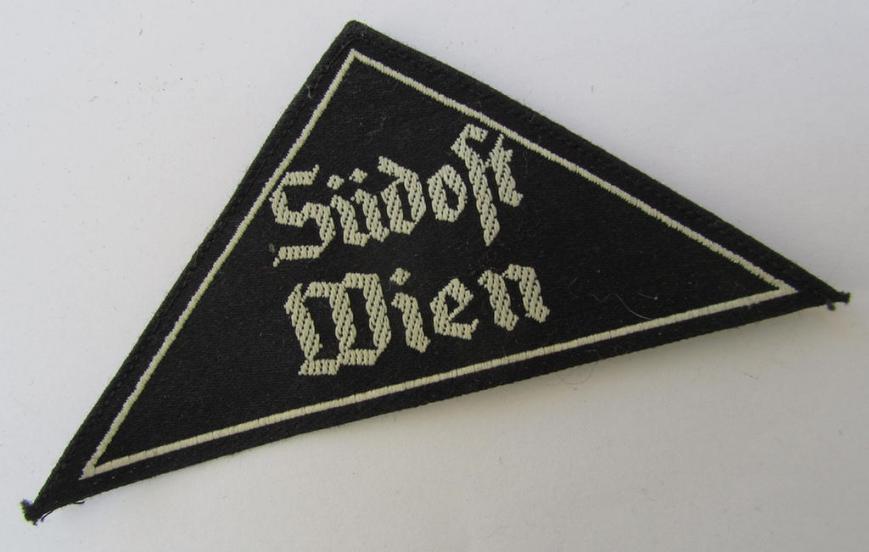 Very nice - and truly rarely encountered! - HJ/BDM ('Hitlerjugend'/'Bund Deutscher Mädel') district-triangle entitled: 'Südost Wien', still retaining its period-attached 'RzM'-etiket - very nice (IMO virtually mint-/unissued-) condition!