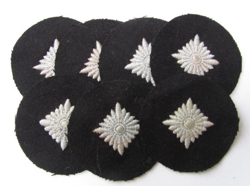 Waffen-SS- (ie. Heeres-'Panzer'-) type, machine-embroidered rank-badge (or: roundel) as executed on smooth-type & black-coloured wool, as intended for an: 'SS-Oberschütze' (ie. Heeres 'Oberschütze')