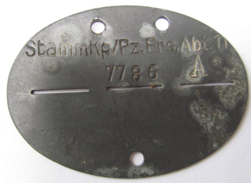 Unusual, zinc- (ie. 'Feinzink'-) based WH (Heeres) 'Panzer'-related- ID-disc, bearing the (neatly!) stamped unit-designation: 'Stamm.Kp./Pz.Ers.Abt. 11'