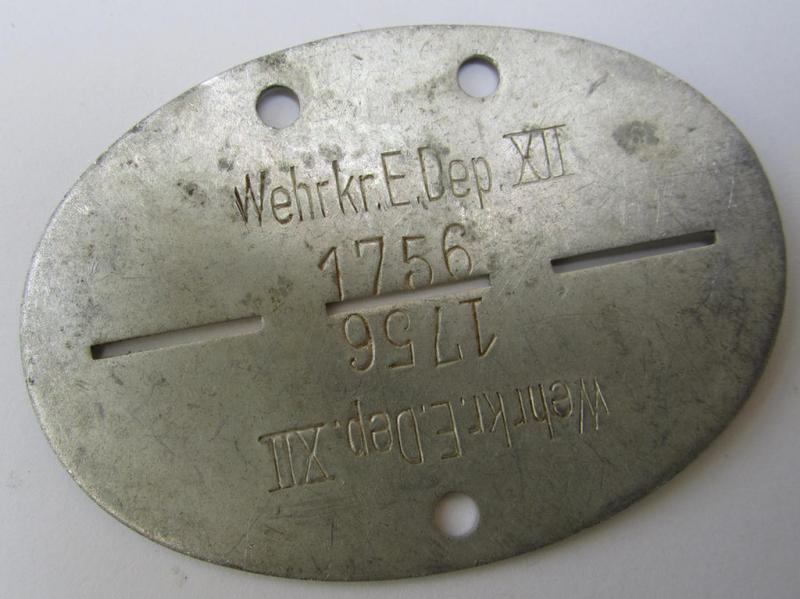 Neat, aluminium-based, WH (Heeres-) ID-disc, bearing the neatly engraved ie. stamped unit-designation: 'Wehrkr.E.Dep.XII' 