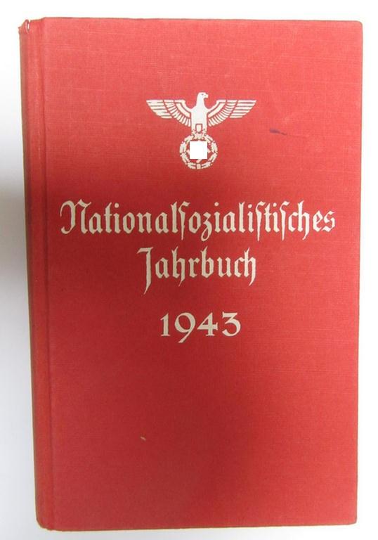 Attractive - and unsually encountered! - N.S.D.A.P.-related year-book (ie. annual diary) entitled: 'Nationalsozialistisches Jahrbuch 1943', in overall very nice and/or fully complete condition