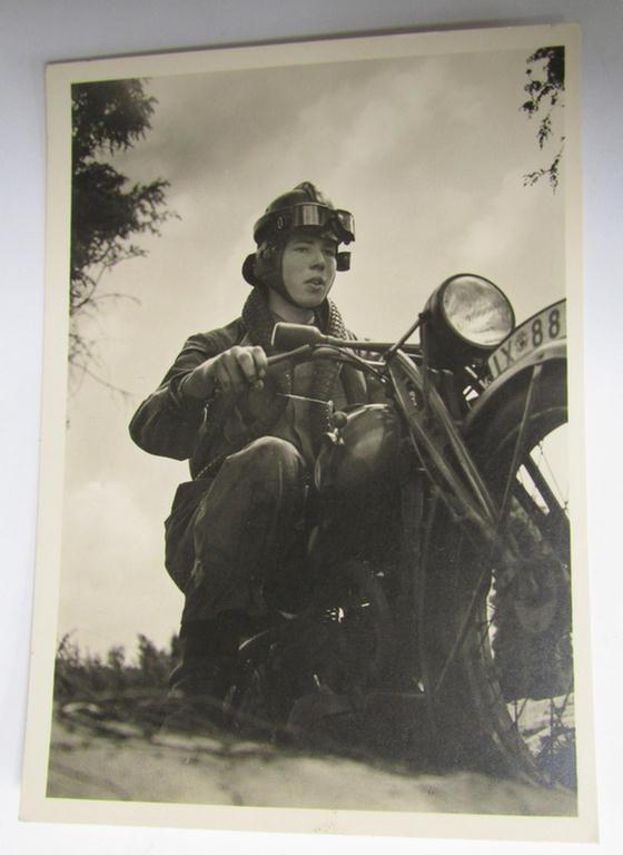 Attractive - and scarcely seen! - example of a period, picture-postcard originating from the 'Reichsjugendführung'-series, depicting a Motor-HJ-member on a motor-cycle and bearing the text: 'Motor-Hitlerjugend - Motor-Hitlerjunge auf Geländfahrt'