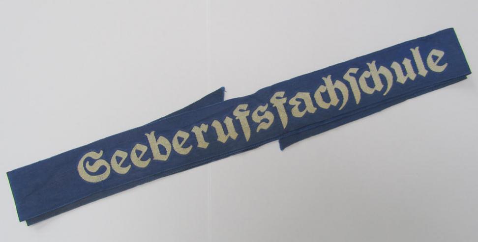 Superb - and with certainty very rarely encountered! - Marine-HJ (ie. 'Marine-Hitlerjugend') cap-tally (ie. 'Mützenband') entitled: 'Seeberufsfachschule' that comes in a very nice ie. moderately used- ie. worn, condition