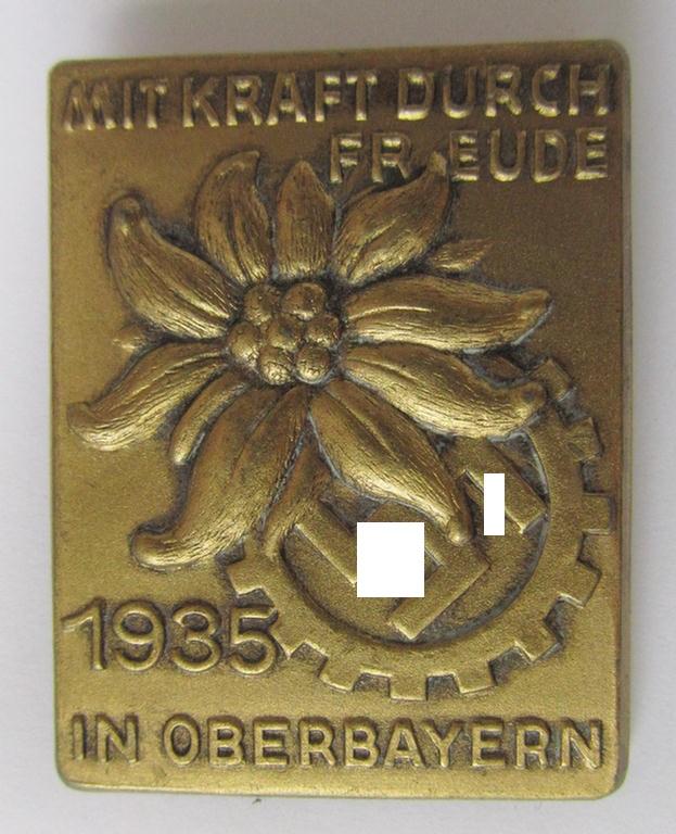 Commemorative- and/or tin-based- 'DAF'- (ie. 'Deutsches Arbeitsfront'-) related 'tinnie', being a non-maker-marked example, showing an 'Edelweiss'-flower and/or DAF-swastika-device and the text: 'Mit Kraft durch Freude in Oberbayern - 1935'