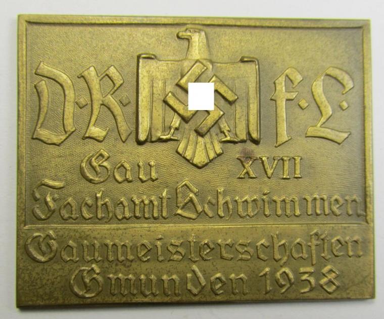 Attractive - and with certainty scarcely encountered! - golden-bronze-toned- ie. 'Buntmetall'-based, so-called: commemorative-sports'-plaque (ie. 'Erinnerungs- o. nichttragbare Medaille') bearing the text: 'D.R.f.L. - Gau XVII - Fachamt Schwimmen'