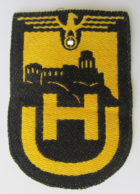 Superb - and truly very unusual and only once before encountered! - linnen-based- and/or: 'BeVo'-woven cloth-based sportshirt-patch depicting a capital: 'H' and 'U', as was intended for usage by students serving within the: 'Universität Heidelberg