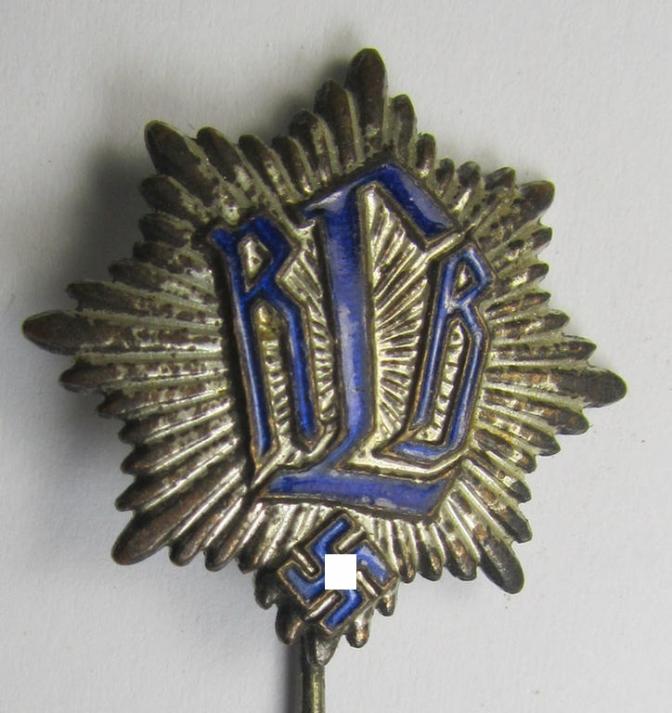 Semi-enamelled RLB- (ie. 'Reichluftschützbund') 'Zivilabzeichen' or: civil-attire badge (of the first pattern) that is neatly maker- (ie. 'Enders u. Oberrahmede'-) marked and bearing a patent-pending- (ie. 'Ges.Gesch.'-) marking on its back