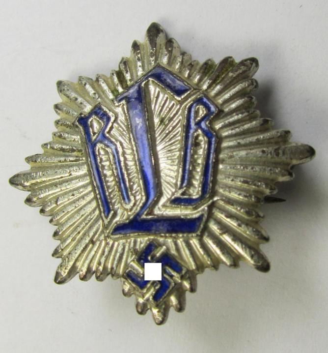 Semi-enamelled RLB- (ie. 'Reichluftschützbund') 'Zivilabzeichen' or: civil-attire badge (of the first pattern) that is neatly maker- (ie. 'Enders u. Oberrahmede'-) marked and bearing a patent-pending- (ie. 'Ges.Gesch.'-) marking on its back