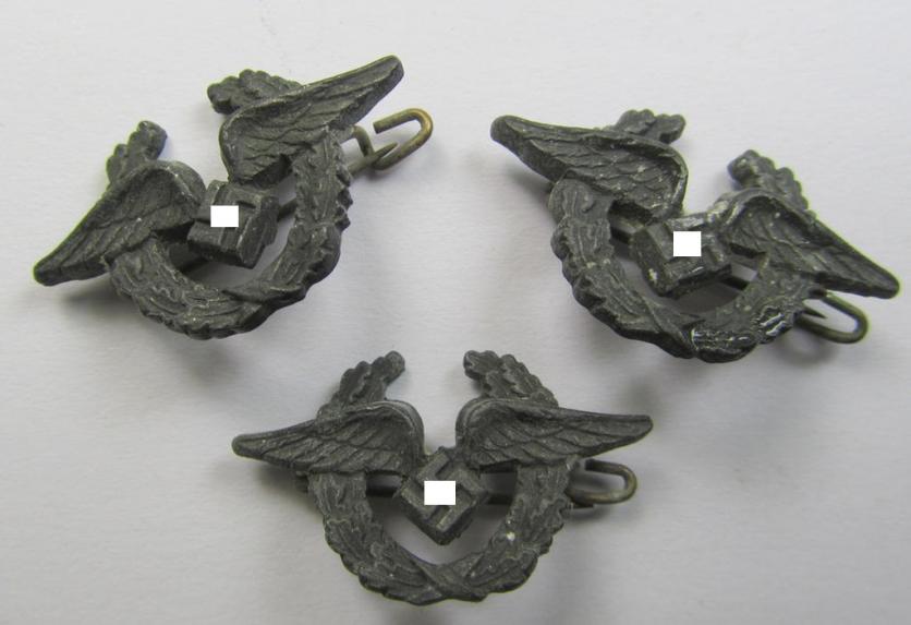 Greyish-coloured WH (Luftwaffe-related), zinc- (ie. 'Feinzink'-) based so-called: 'Dienstbrosche' (aka 'Abzeichen für Angestellte und Arbeiter der Luftwaffe') being an example of the second pattern