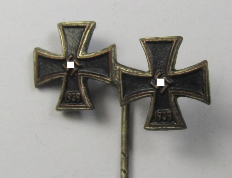 Detailed, 9-mm.-sized medal-lapel-pin, being a non-maker-marked example depicting respectively: an 'EK I. Klasse' and an: 'EK II. Klasse'